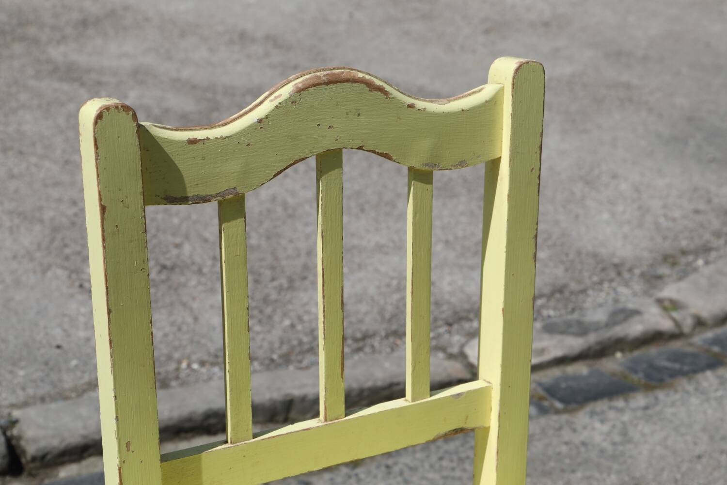 Formica and yellow wood chair