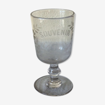 Ancient glass engraved "remembering the party"