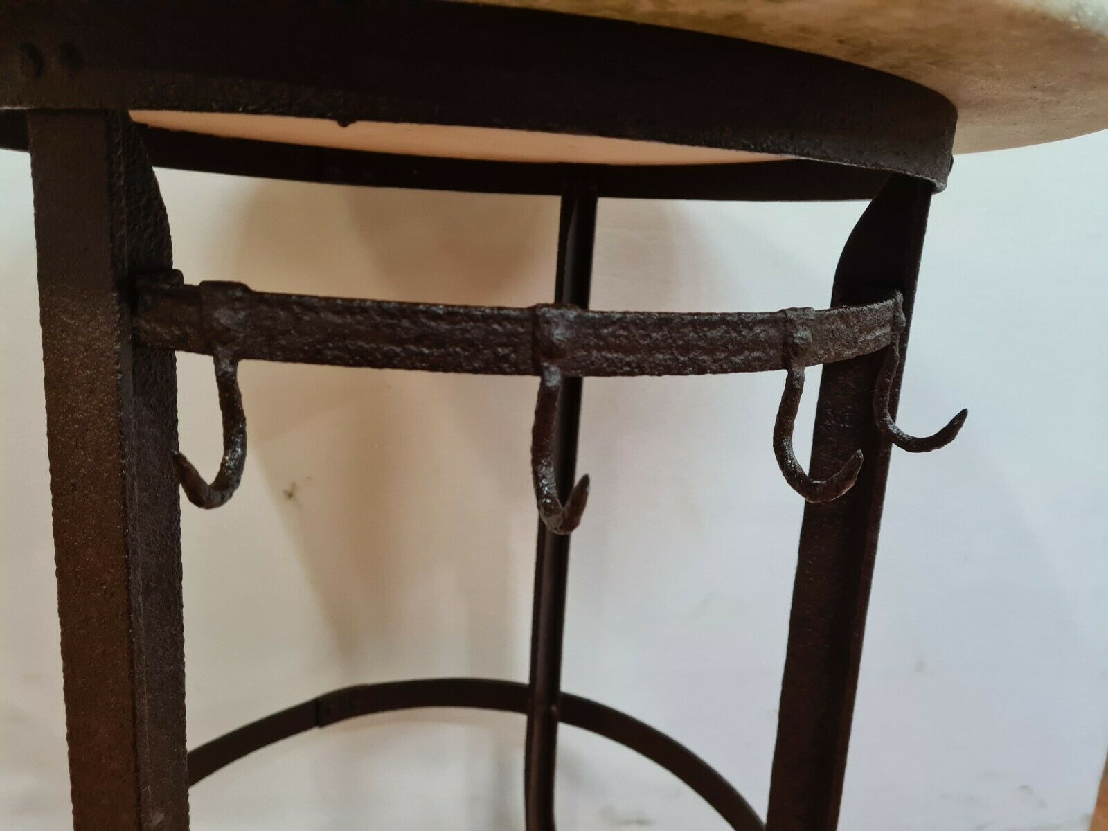 Iron pedestal table and marble top