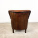 Fauteuil en cuir de mouton foncé fijnaart