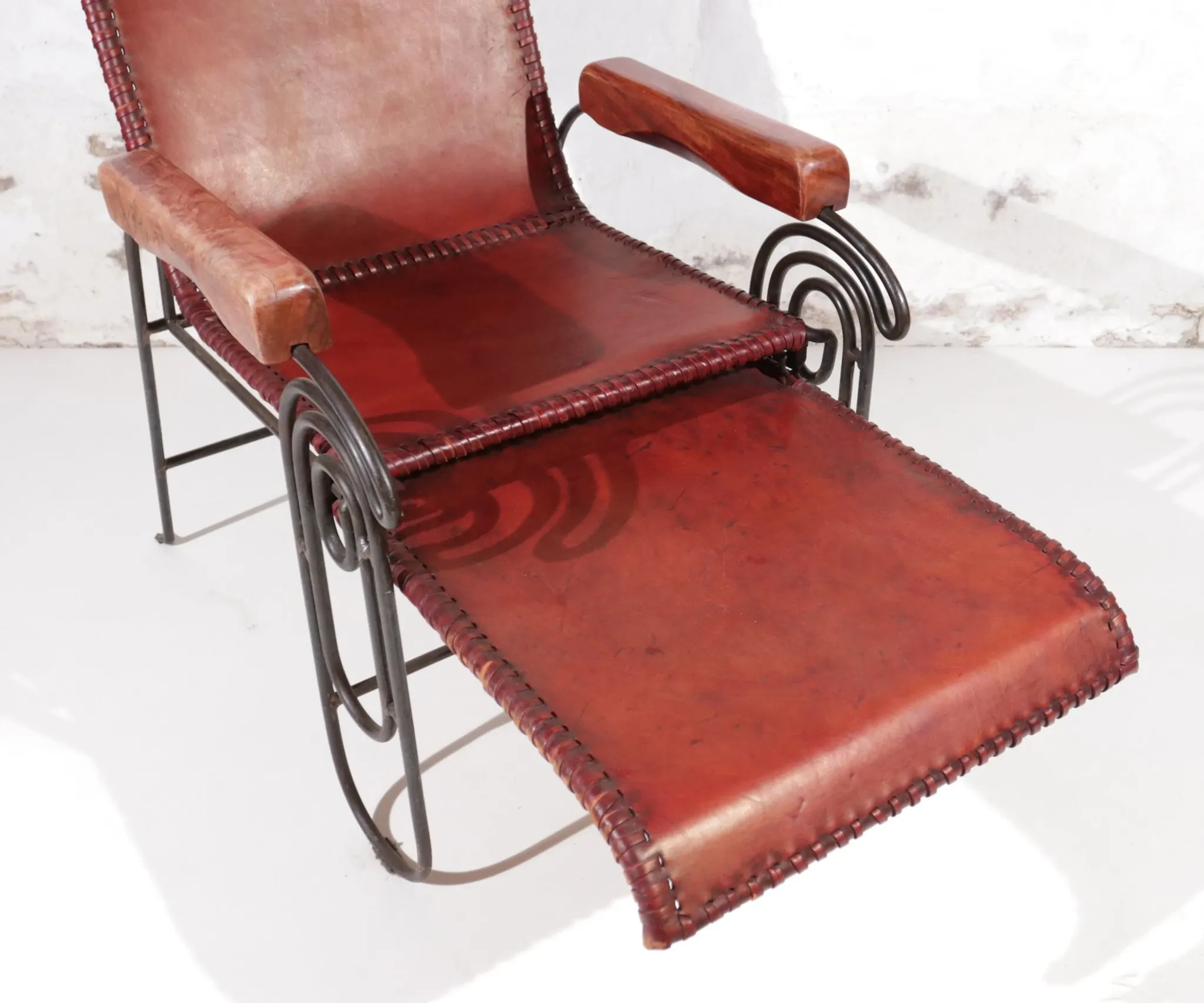 French art deco lounge chair in wrought iron and leather with footrest