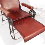 French art deco lounge chair in wrought iron and leather with footrest