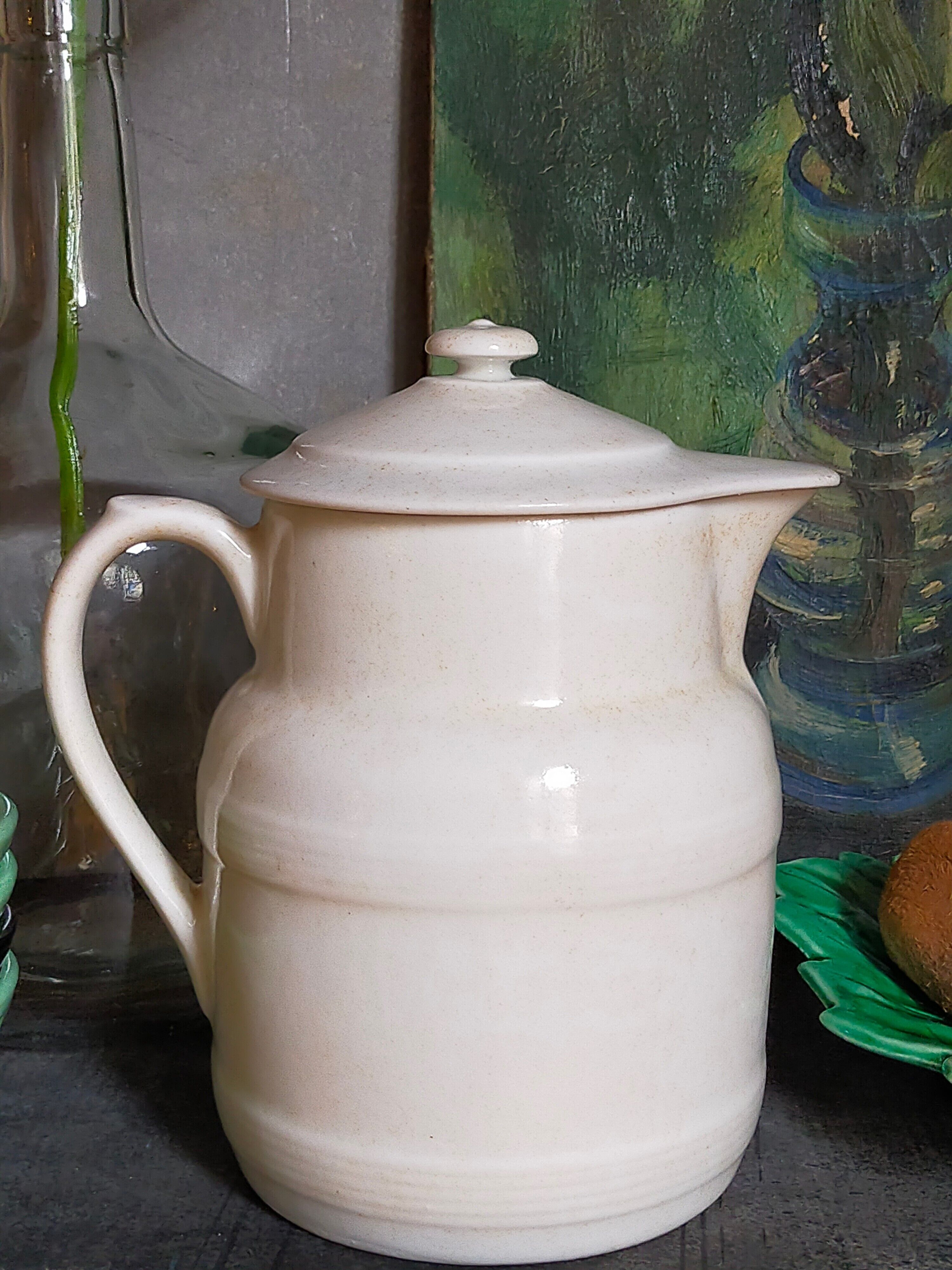 Covered pitcher in porcelain fire of Grigny XIXth stamped P.Precious