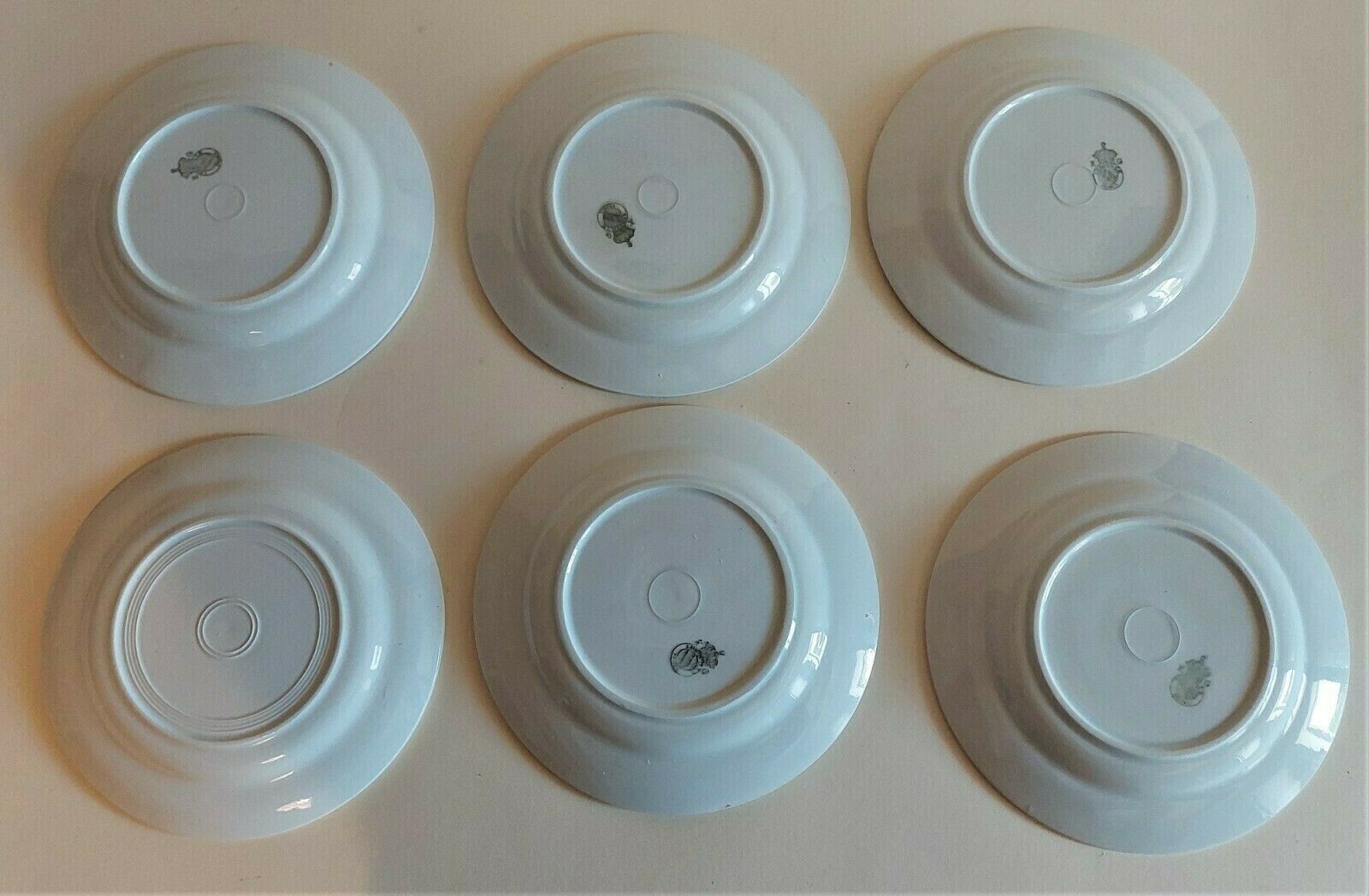 Series of six Lunéville KG earthenware dessert plates