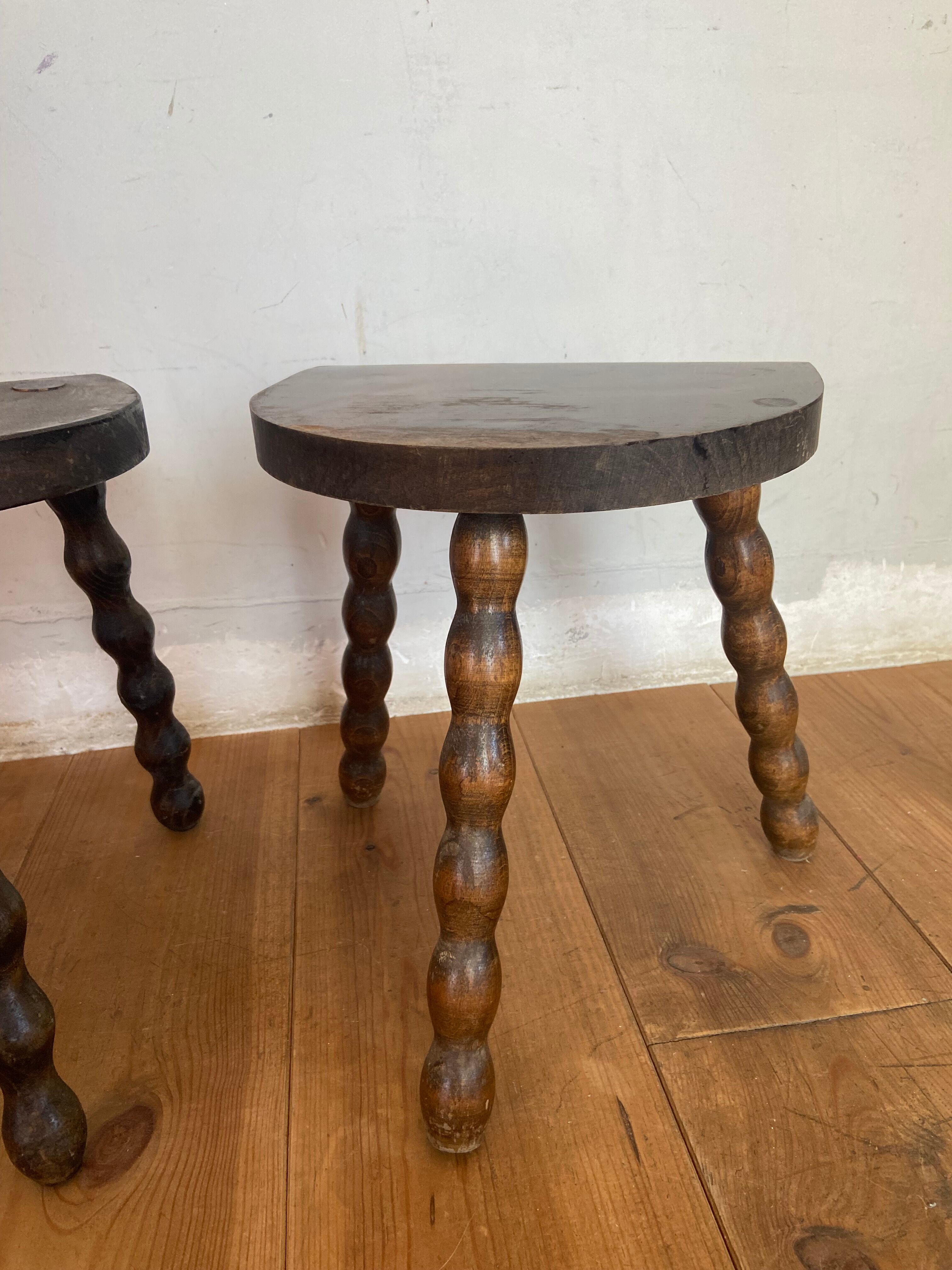 Pair of old low slag stools