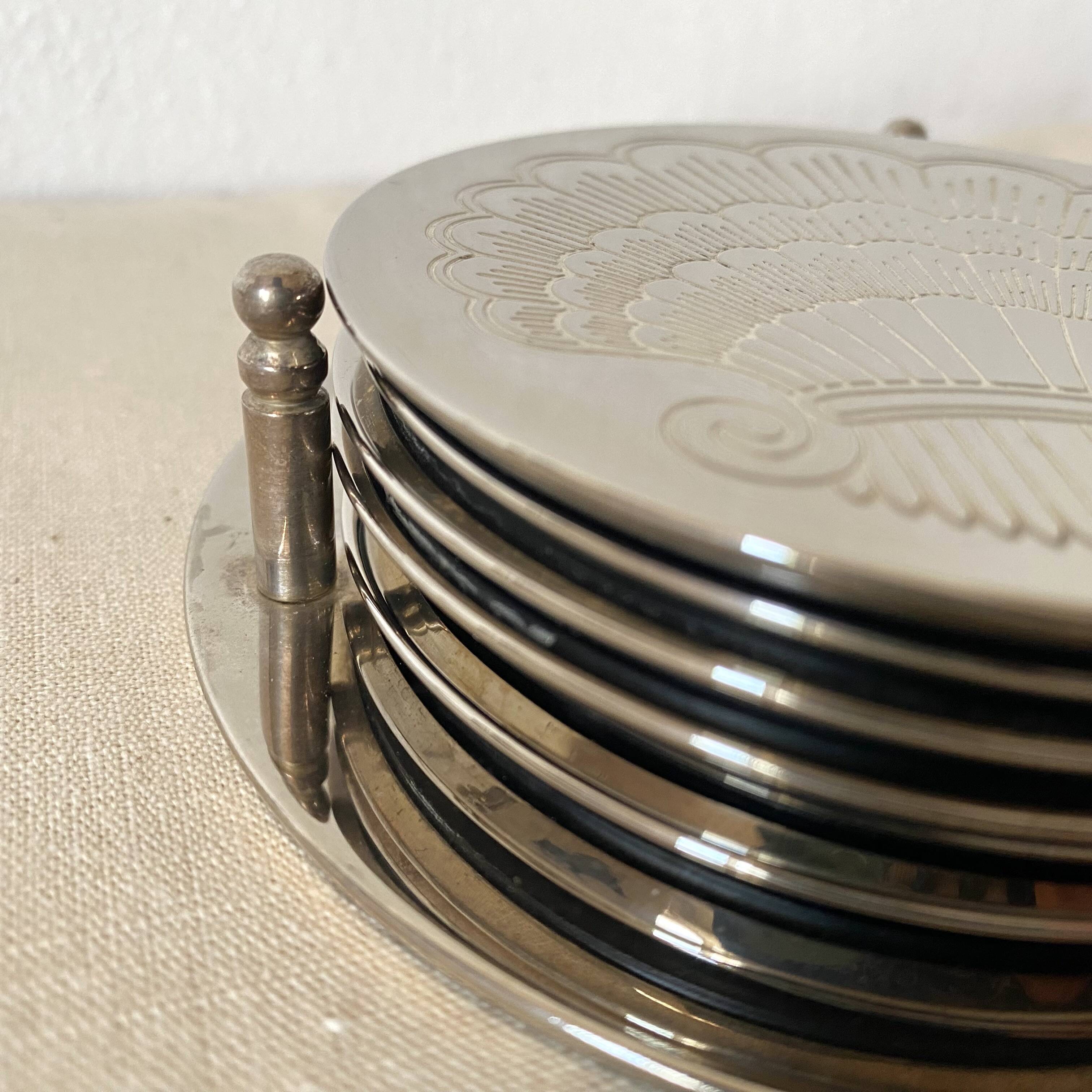 Silver coaster and holder, shell, 80s