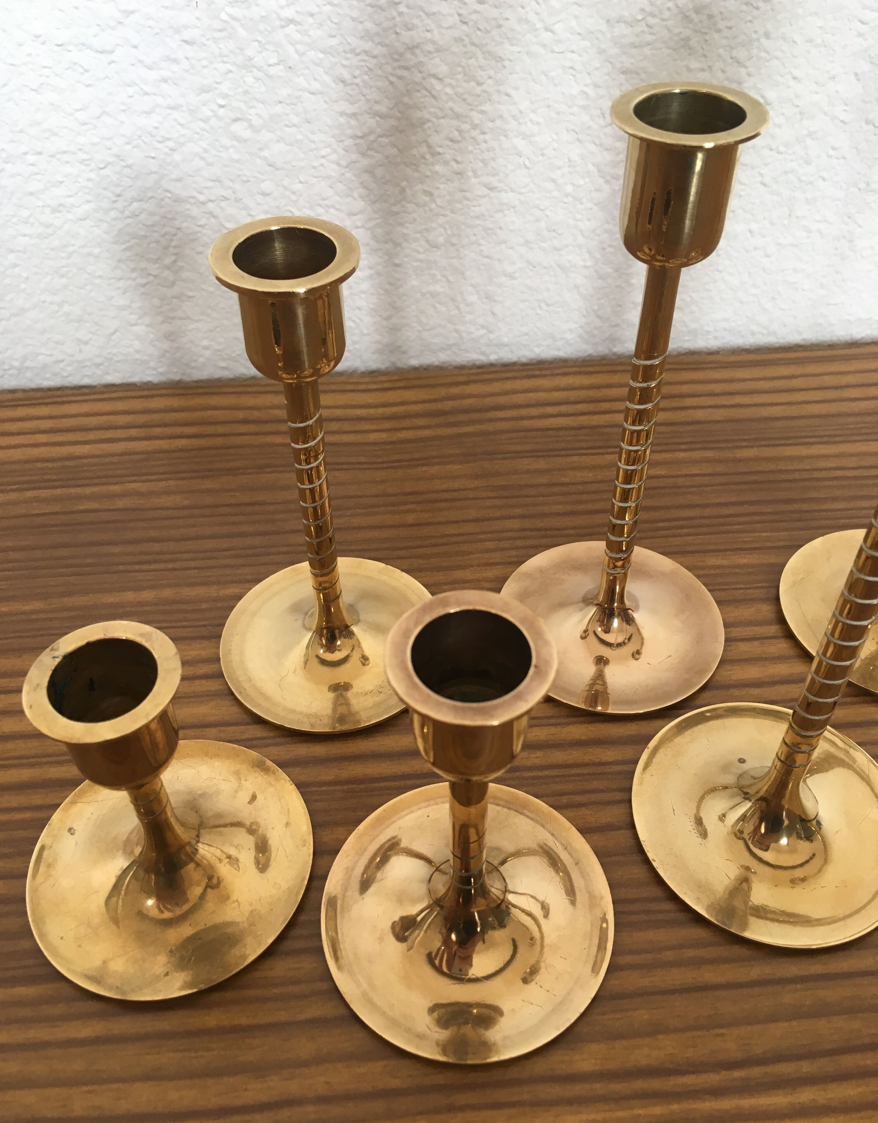 Series of 7 Scandinavian brass candlesticks