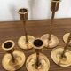 Series of 7 Scandinavian brass candlesticks