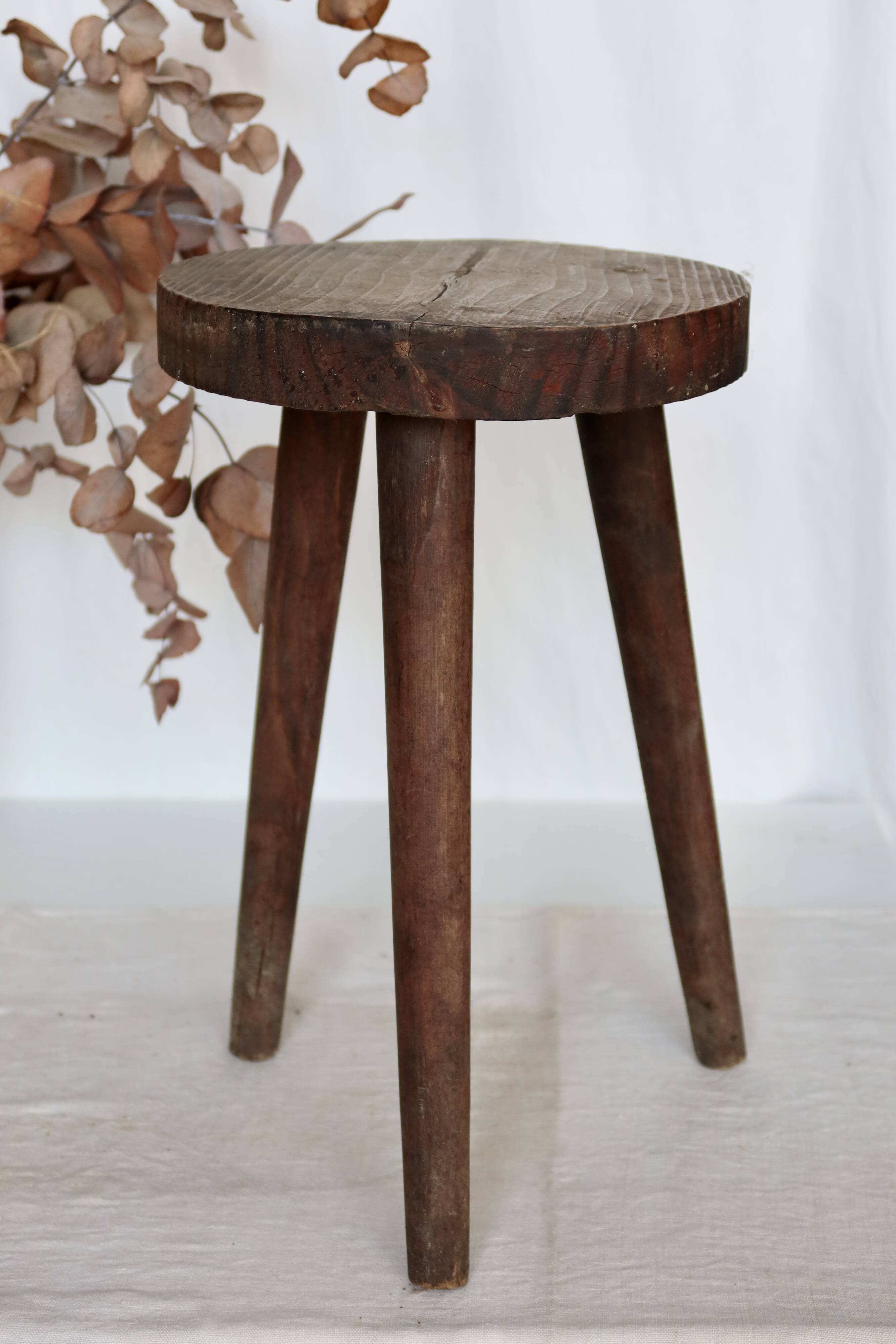 Vintage wooden tripod stool