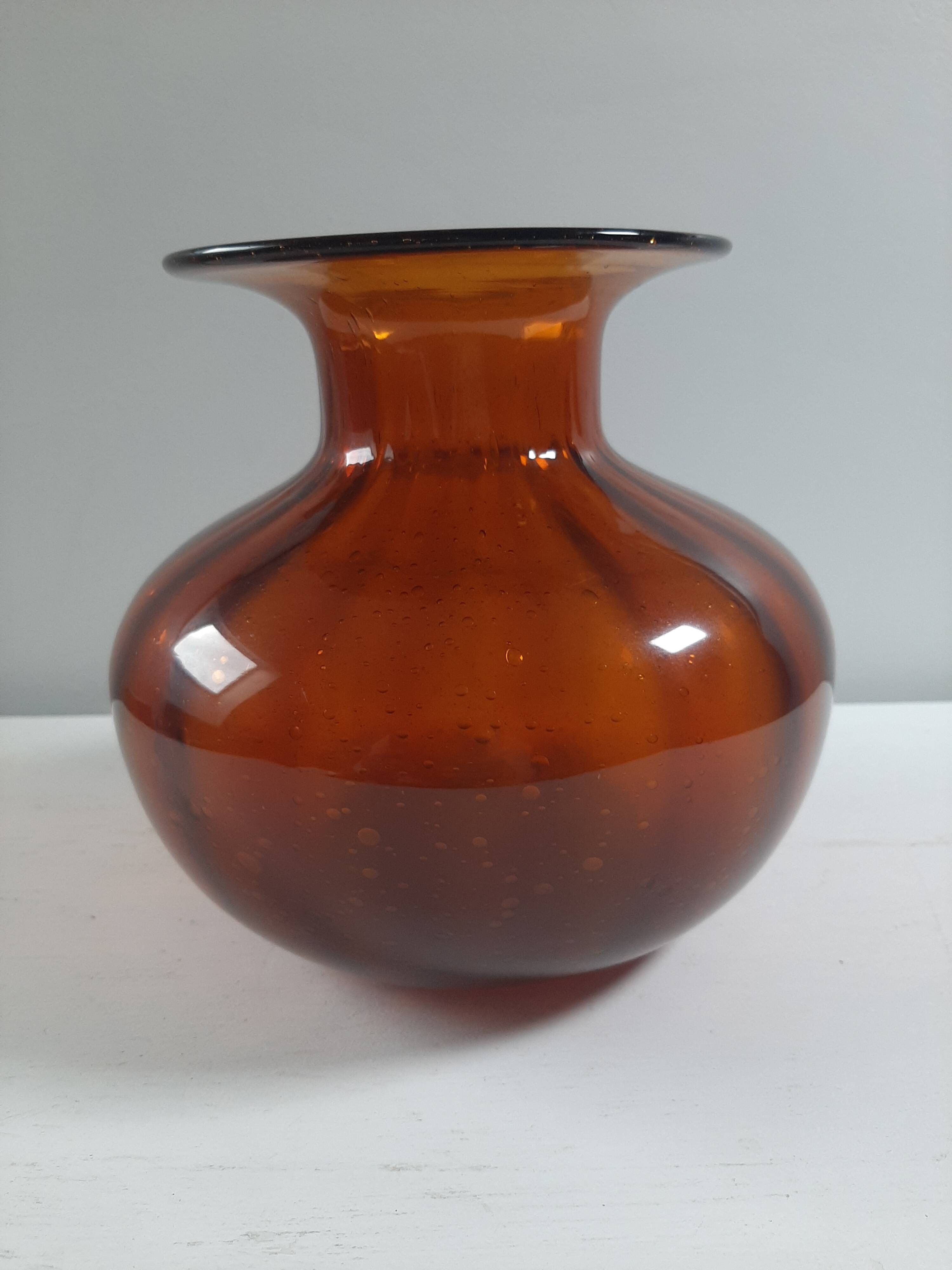 Orange vase in bubbled glass