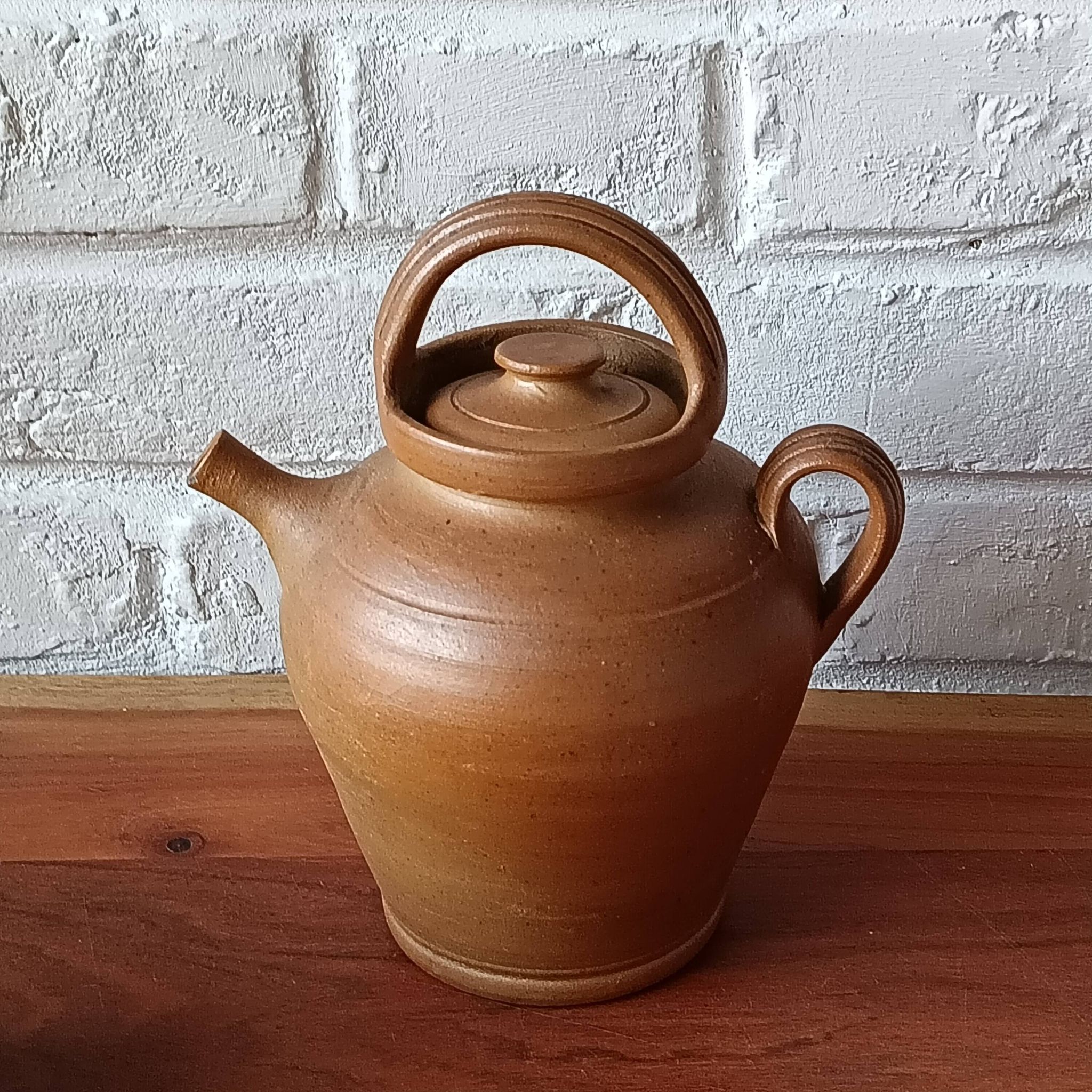 Vintage handmade brown glazed stoneware gargoulette.