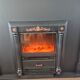 Luxury electric fireplace and classic black mantel suite