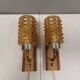 A set of wall lamps in teak wood, with amber colored glass