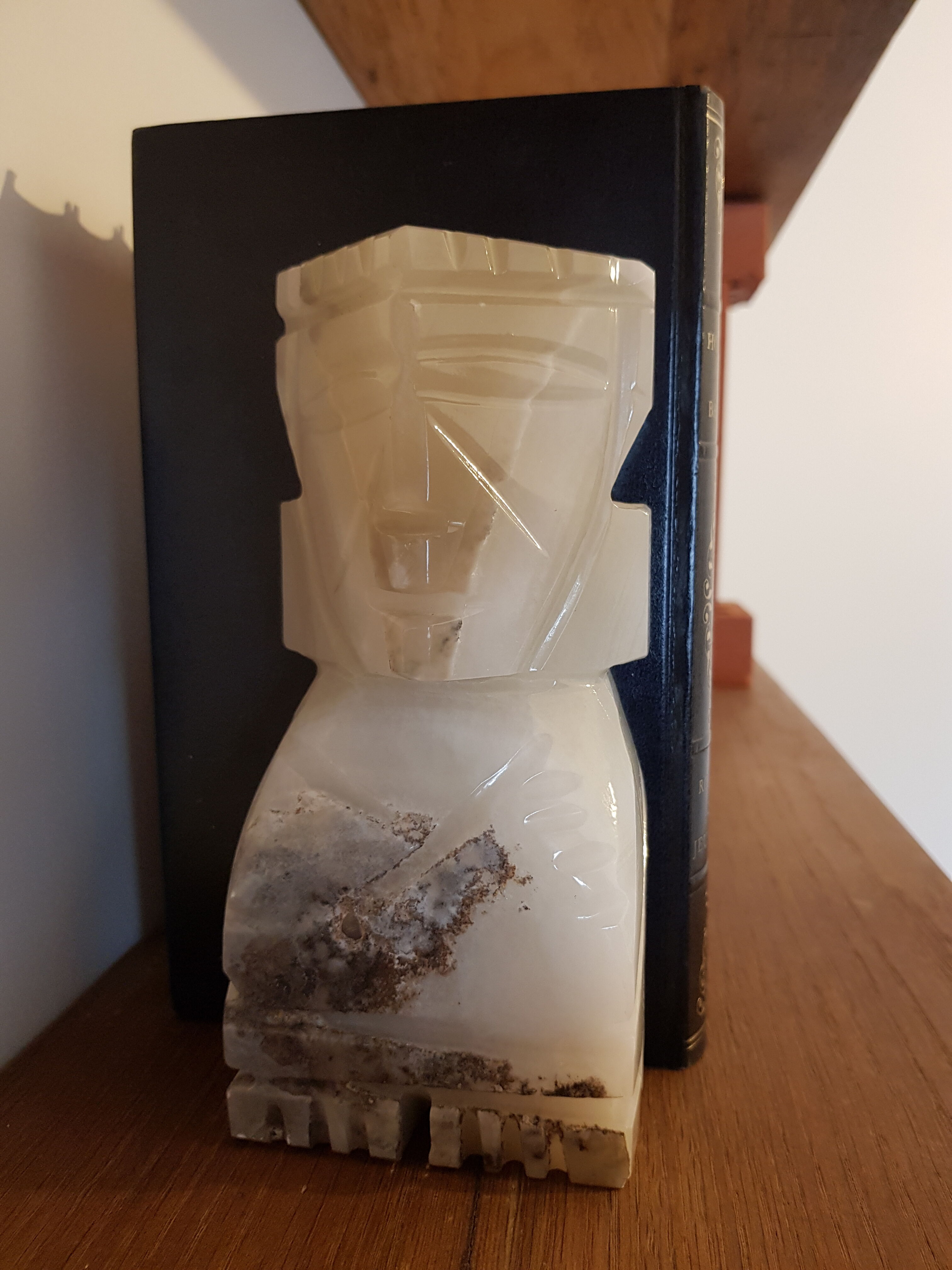 Onyx book clambands depicting an Aztec statue