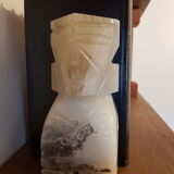 Onyx book clambands depicting an Aztec statue