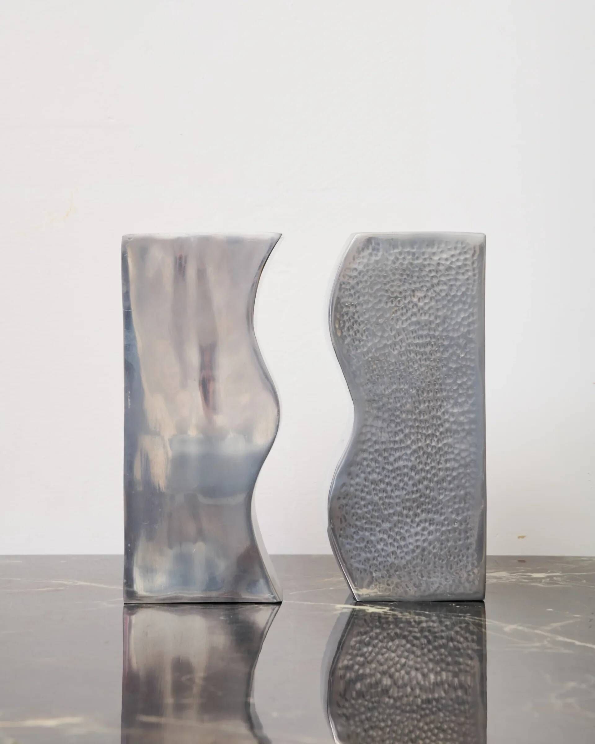 Pair of aluminium cast vases "Sea", 1970s