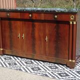 Flamed mahogany enfilade with sea green marble in Empire style.