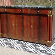 Flamed mahogany enfilade with sea green marble in Empire style.