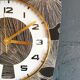 Vintage silent wall pendulum clock 60s trapeze "Gingko black gold"