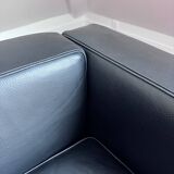 Black leather designer armchair – an elegant piece