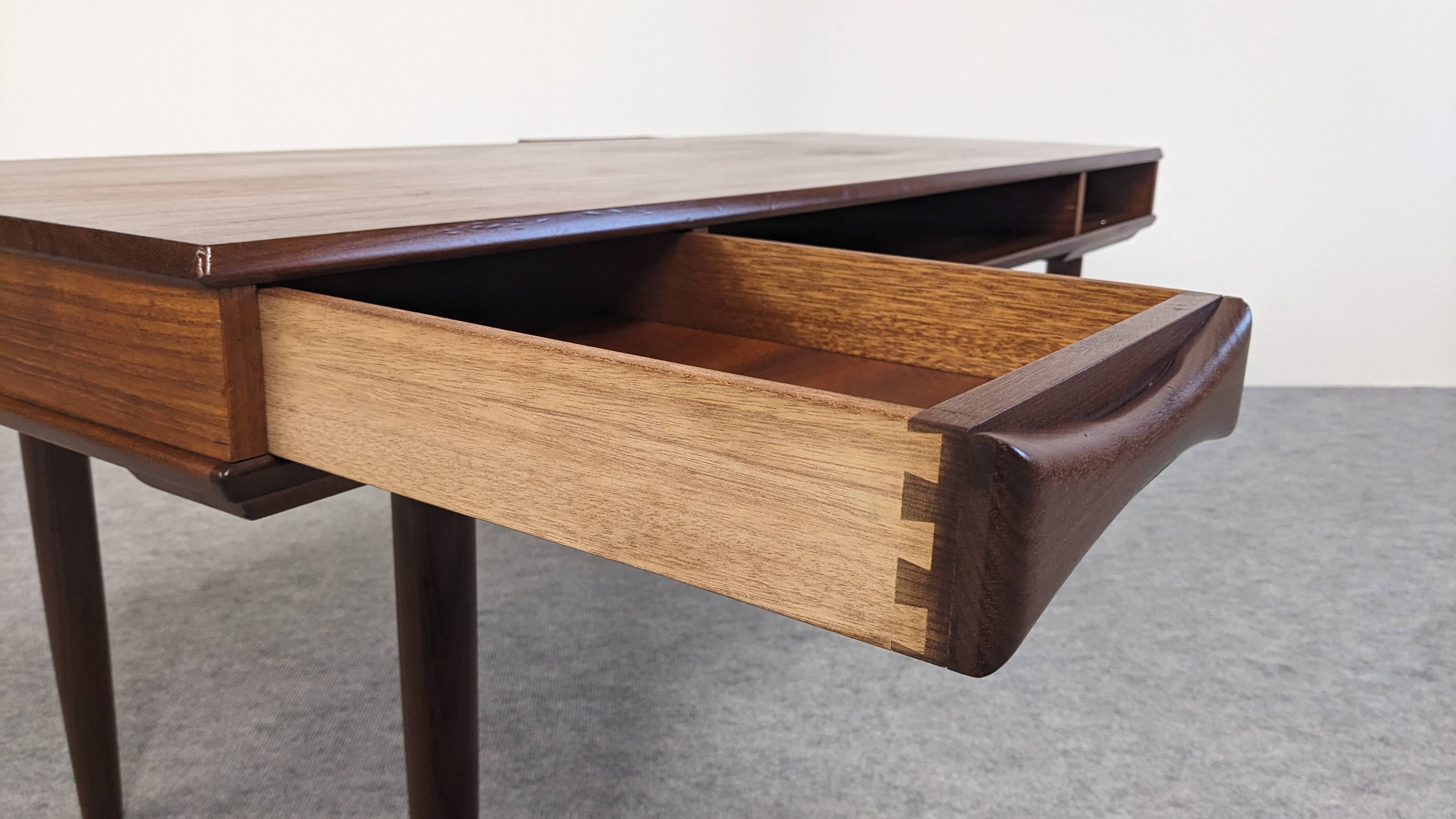 Modernist teak coffee table by Arne Vodder for Dyrlund, Denmark 1960.