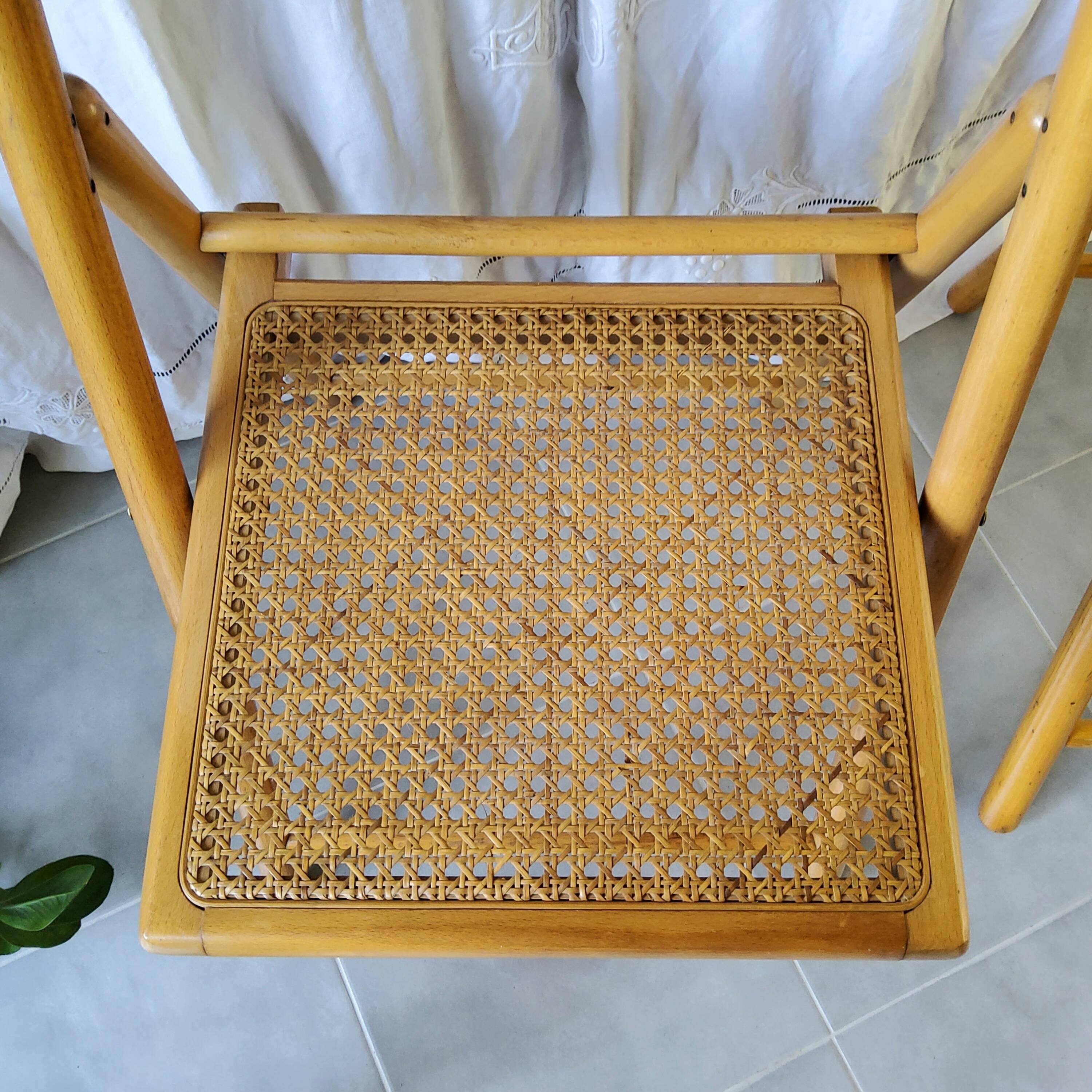 Pair of folding cane chairs