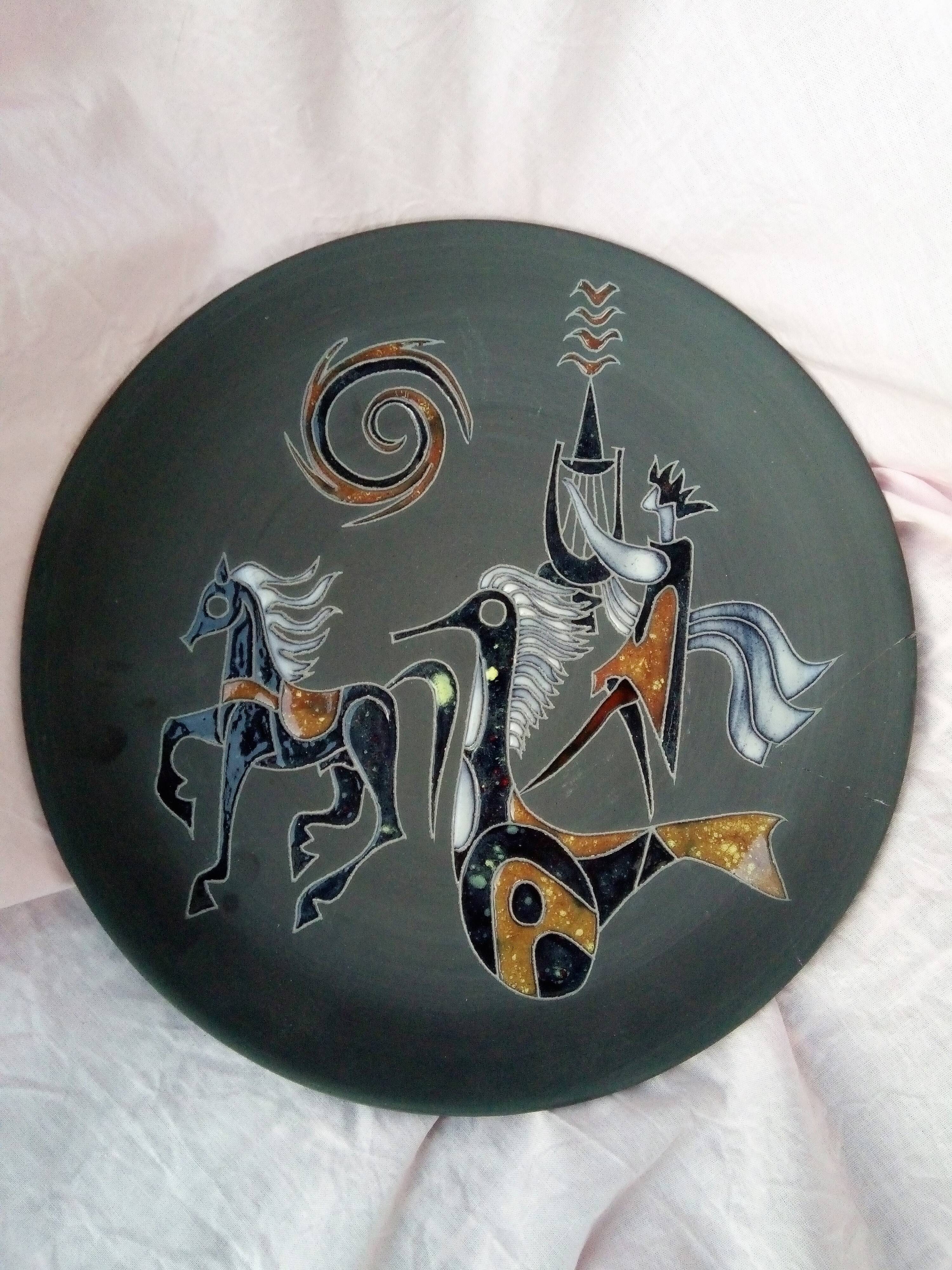 Rare pair of ceramic plates and enamel with mythological decoration. The 50s.