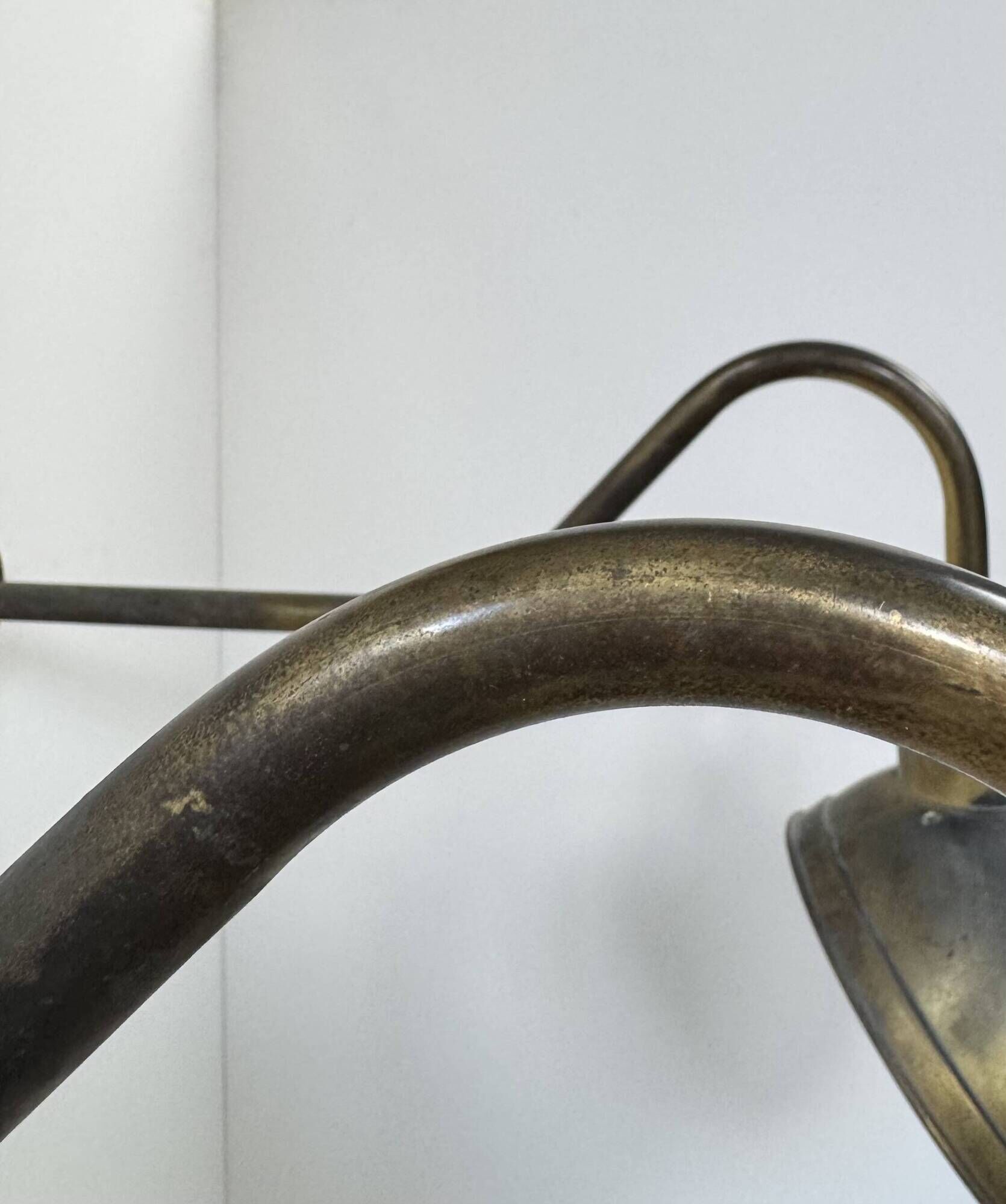 Pair of XL patinated brass wall lights, France, 1970.