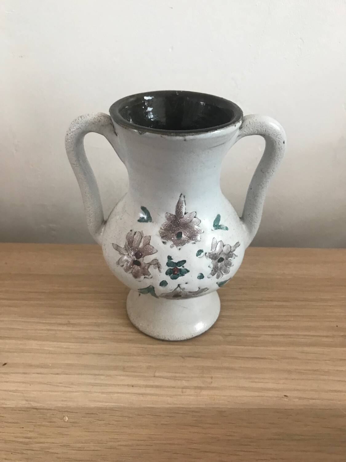 Small stoneware vase with handles and floral motifs Enameled In very good condition