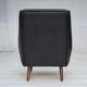 1970s, Danish highback armchair, black artificial leather, teak wood legs.