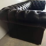 Black leather chesterfield sofa