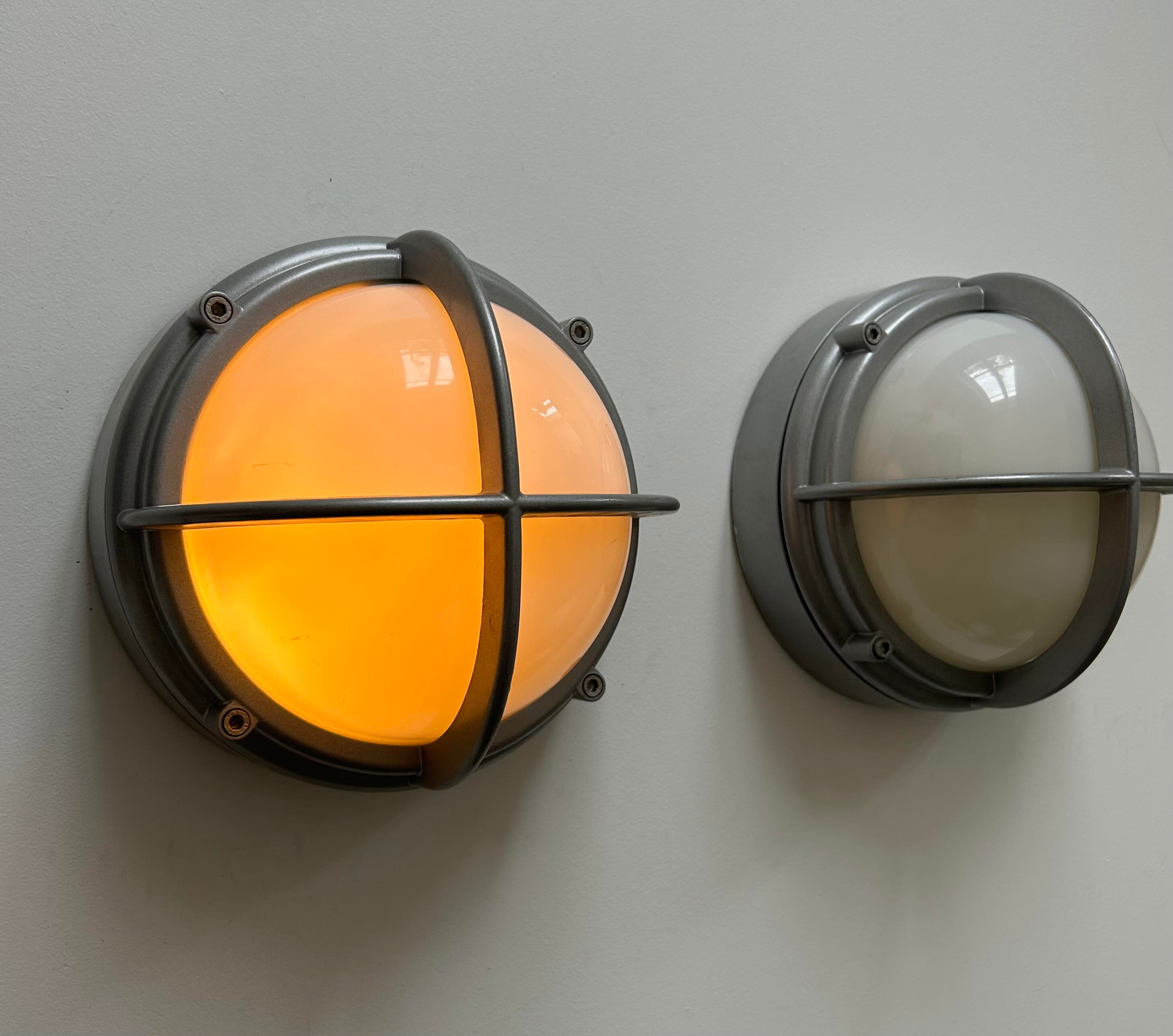 Pair of vintage SYOT, Louis Poulsen, aluminum