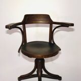 Swivel wooden armchair