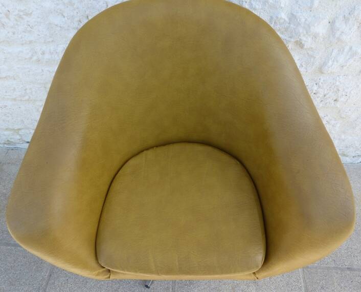 Vintage swivel armchair from the 70s in imitation leather