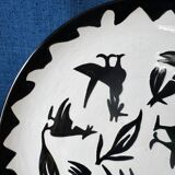 Large ceramic plate J. Lurçat with zoomorphic decoration in black on a white background.