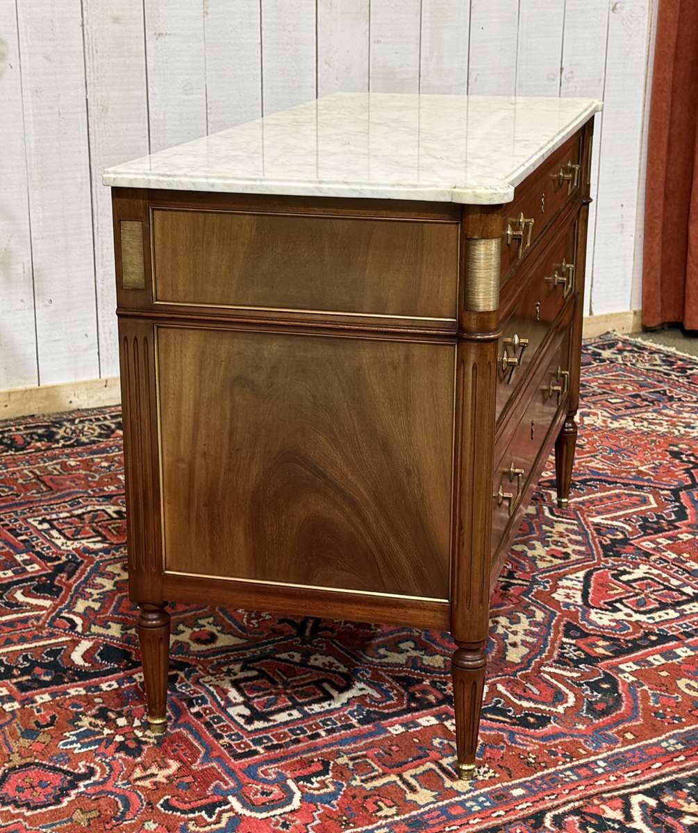Louis XVI commode in mahogany with a marble top from the 1950s.
