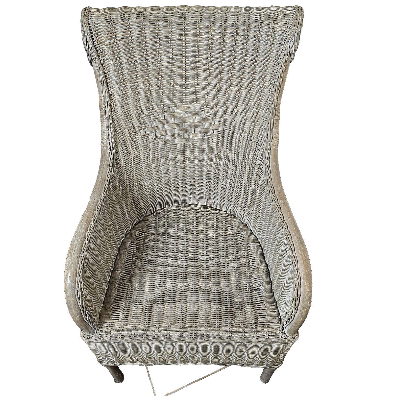 Gray patinated rattan armchair