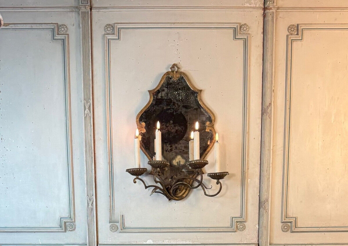Gold metal wall mirror, in the style of Maison Baguès, Paris circa 1950.