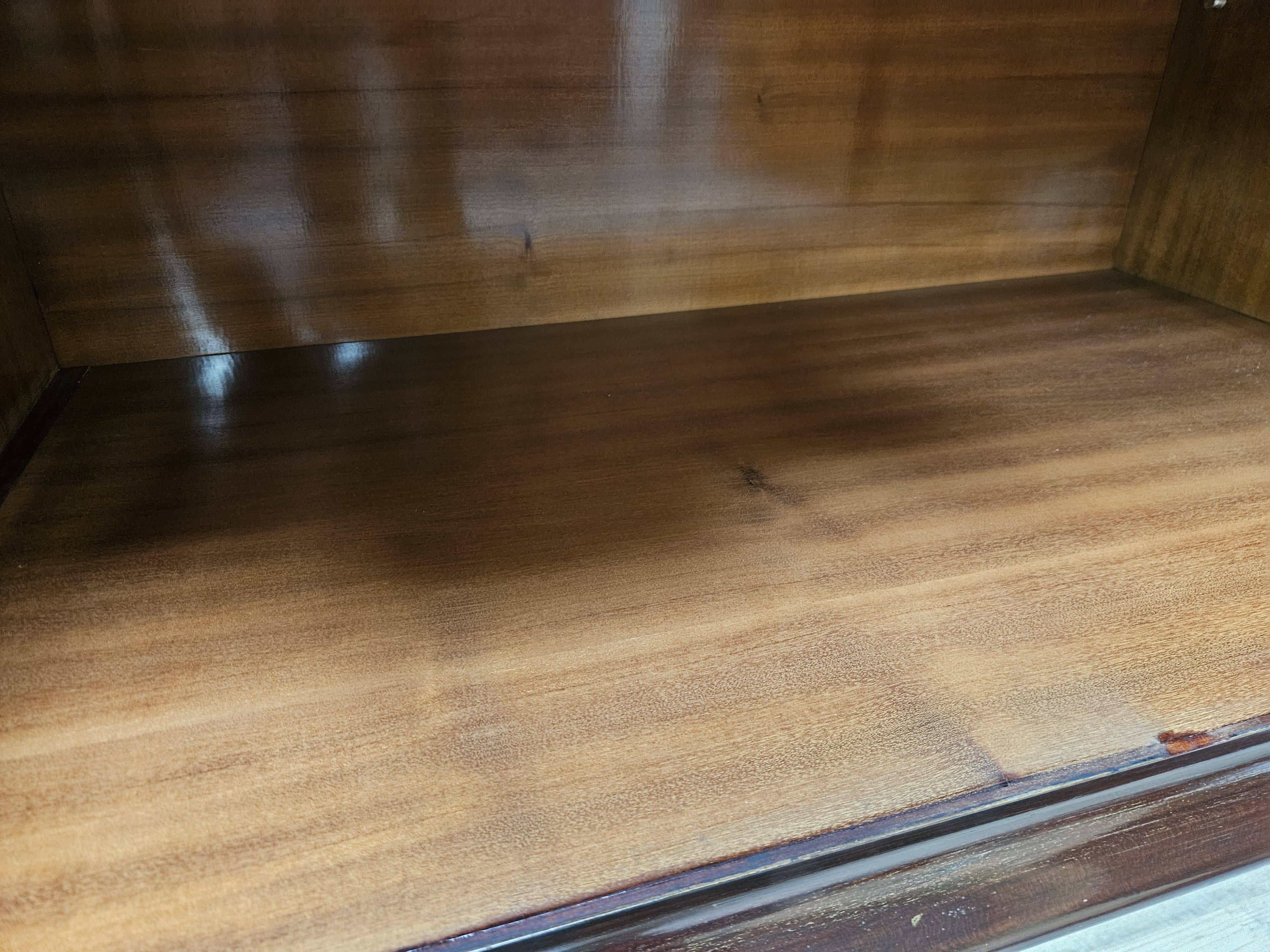 Mahogany sideboard with a glass top, 1960