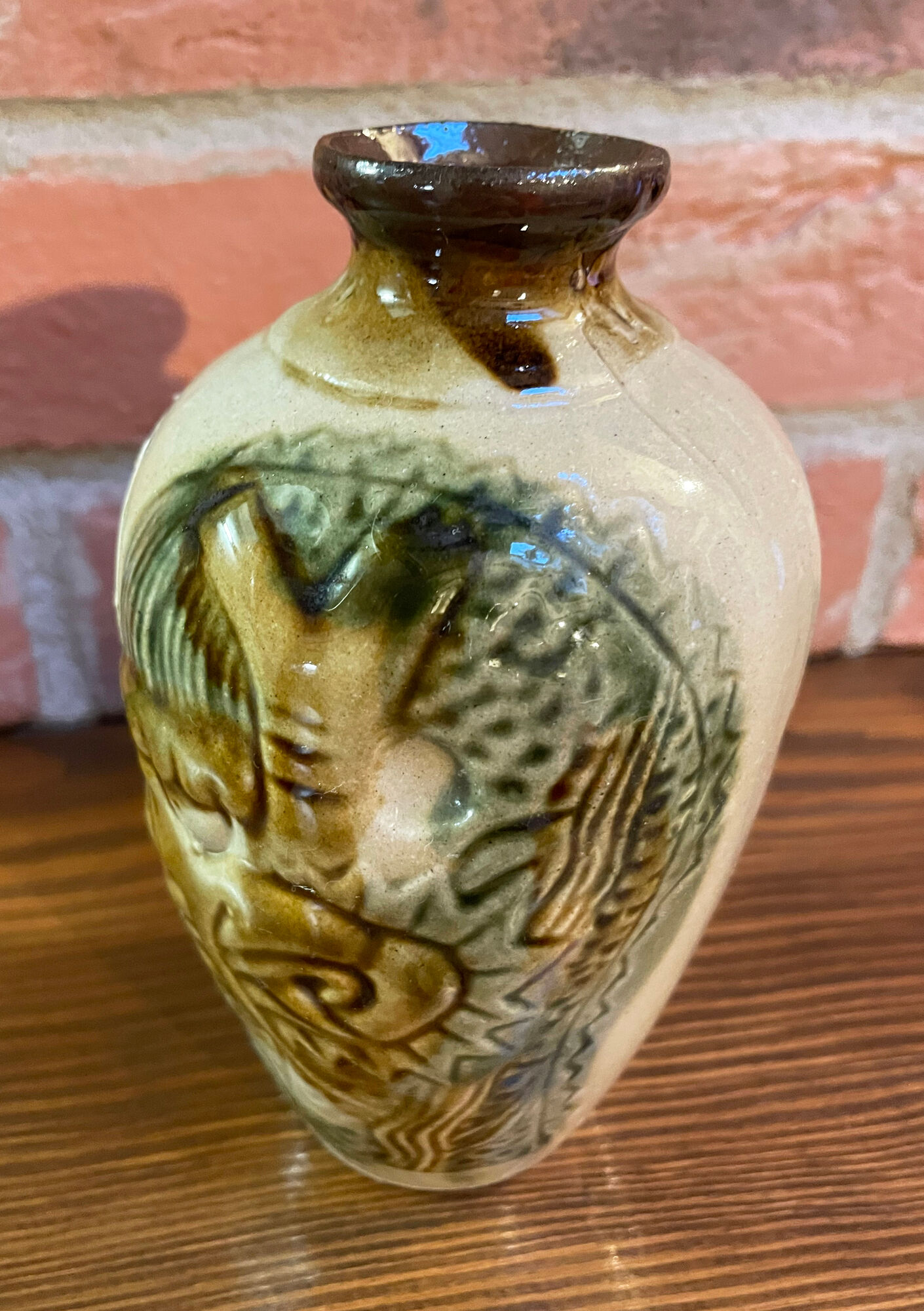 Japanese Awamori Bottle by the Helios Distillery (Okinawa) with Raised Lion and Dragon Design