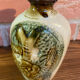 Japanese Awamori Bottle by the Helios Distillery (Okinawa) with Raised Lion and Dragon Design