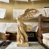 "Winged Victory of Samothrace", beige plaster statuette