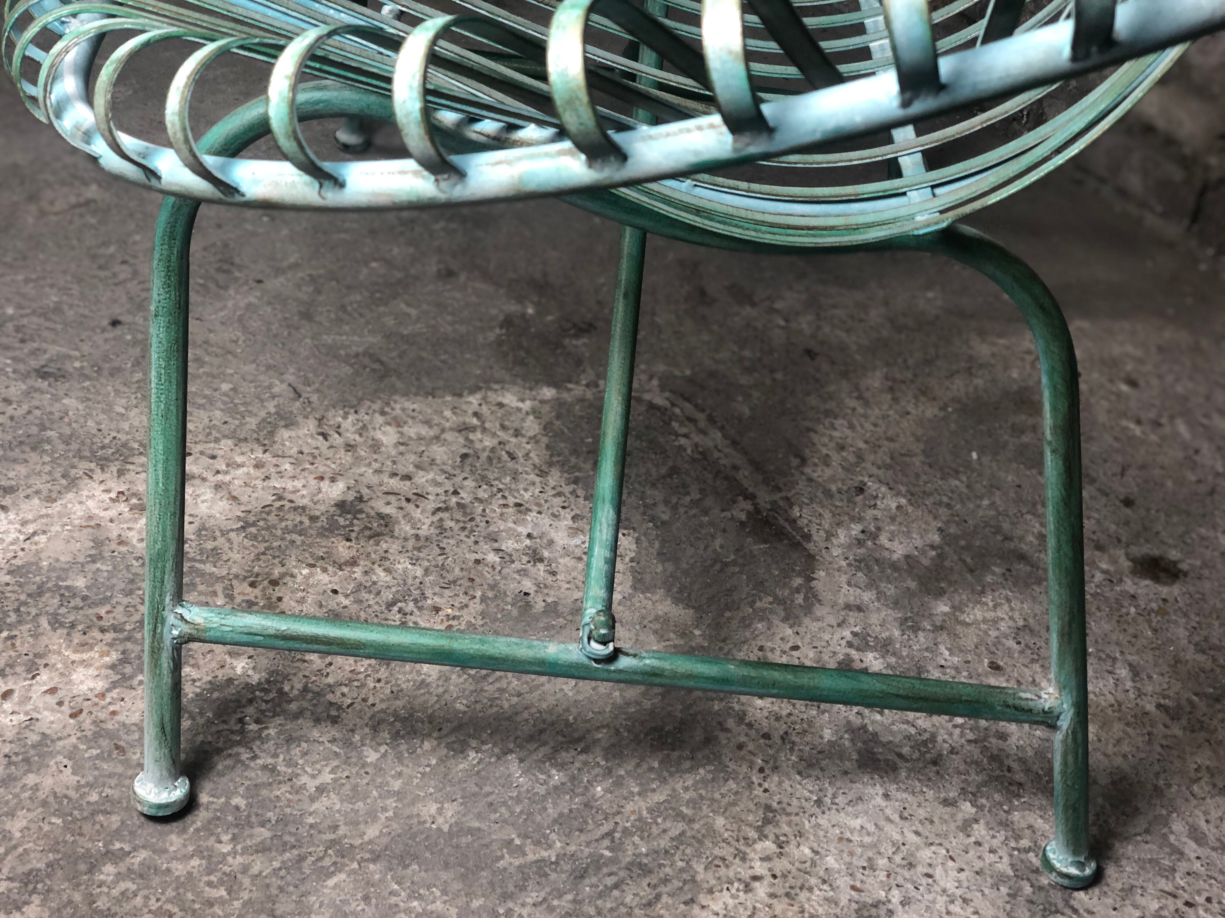 Green patinated iron garden bench