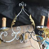 Pair of wrought iron appliques in working order.