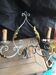Pair of wrought iron appliques in working order.