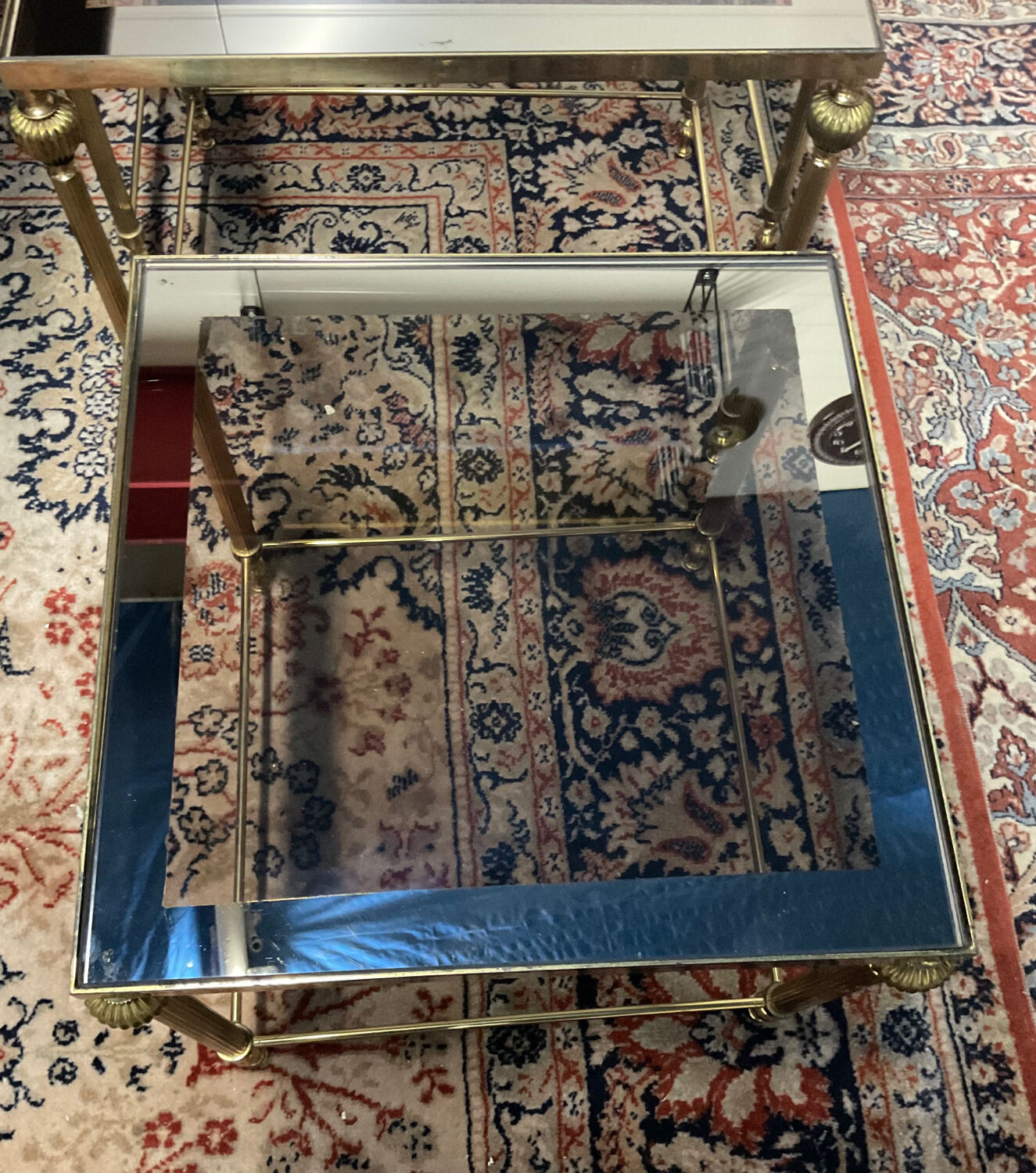 Series of 3 empire style nesting tables in brass and glass