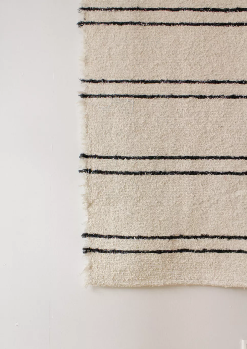 White carpets black Berber lines