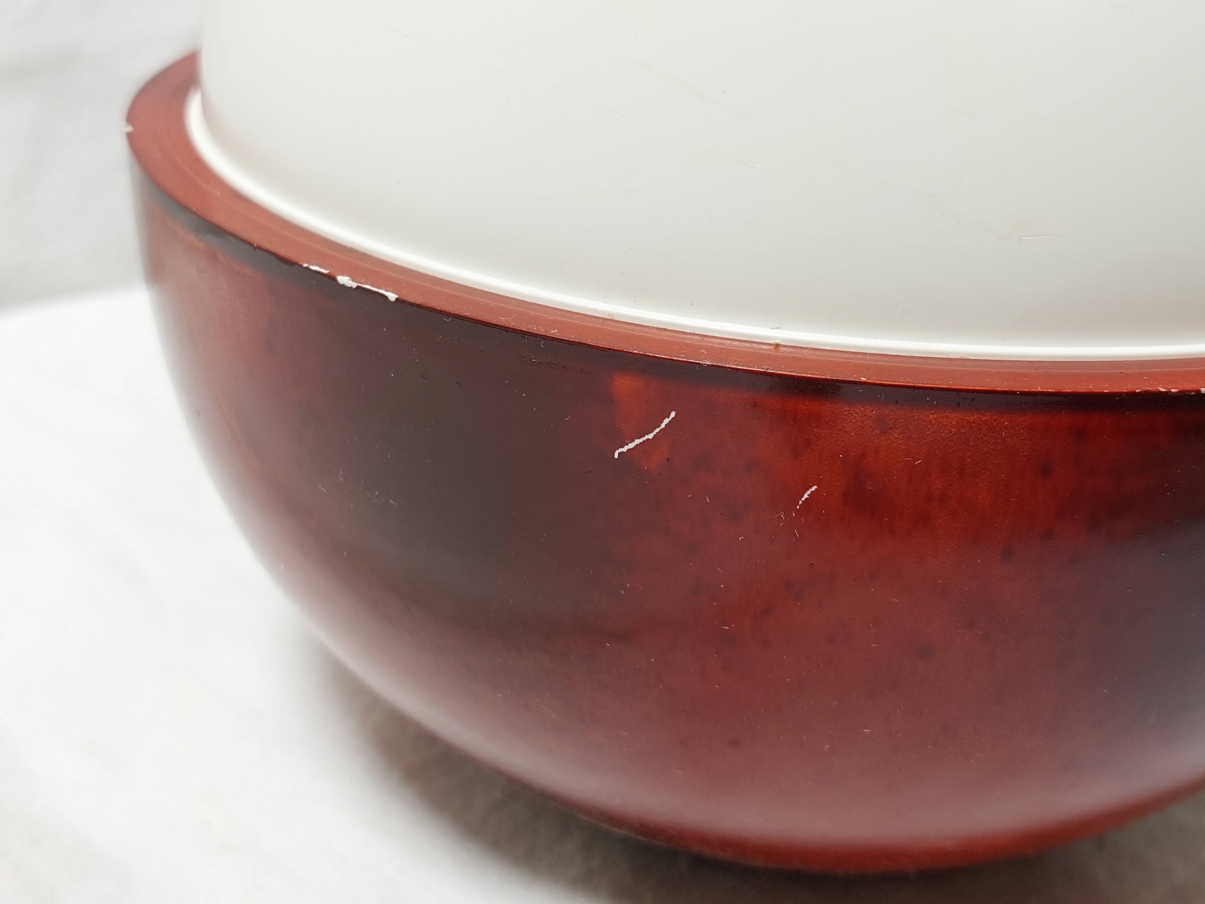 Ice bucket in the shape of an apple, chrome metal and red Bakelite, France, 70s