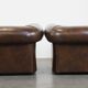 2 Chesterfield armchairs in dark brown cowhide