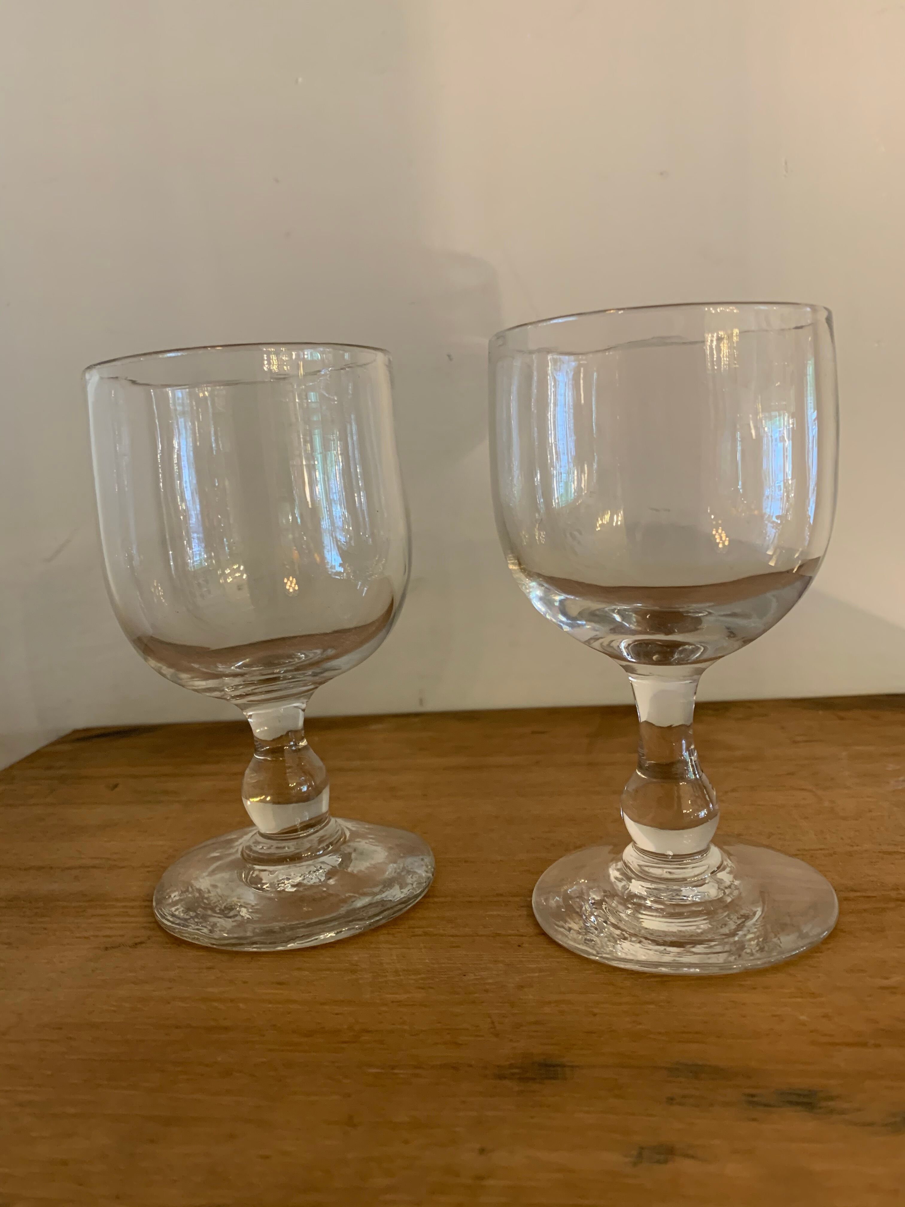 8 old red wine glasses with blown and bubbled glass walk